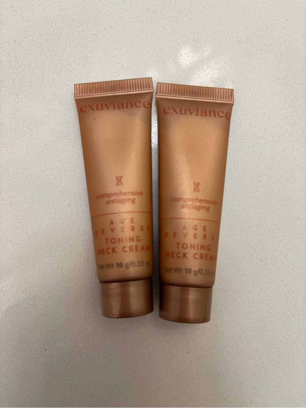 NEW Exuviance Age Reverse Toning Neck Cream - .35oz travel size (Pack of 2)